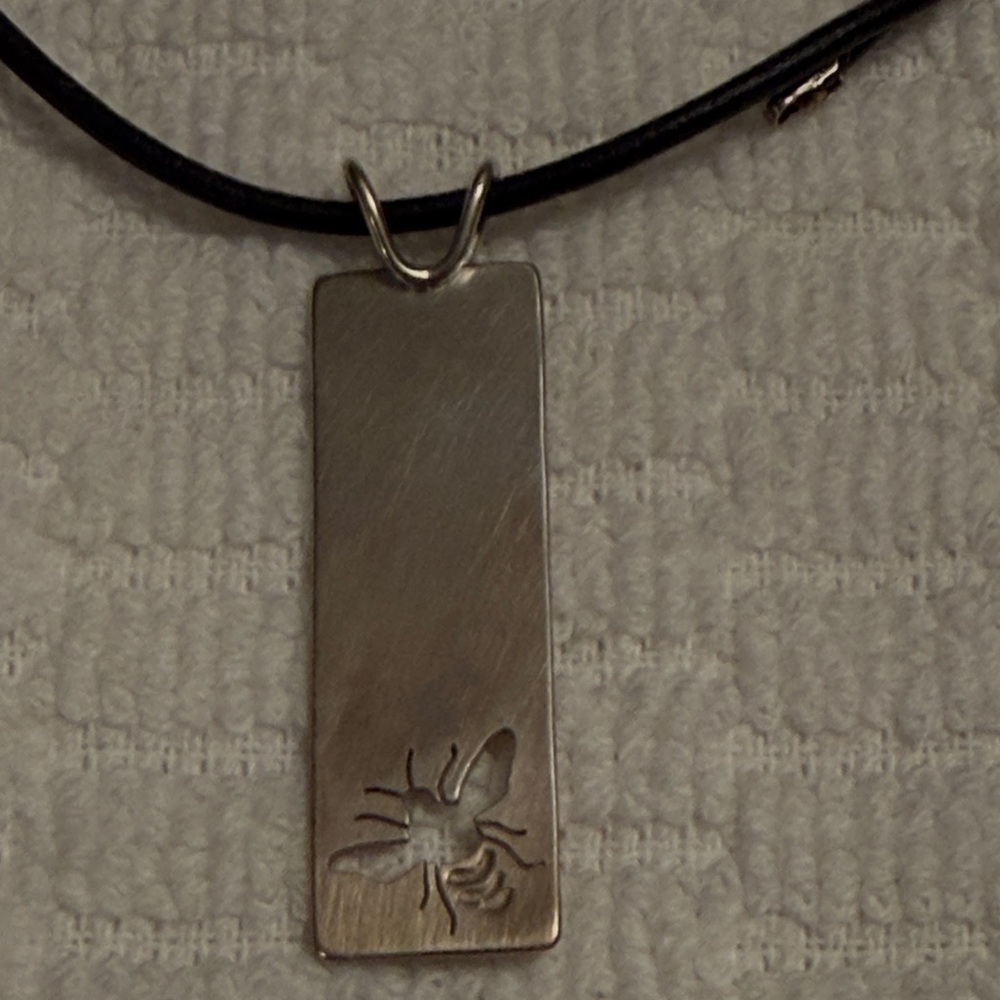 Beth Millner Marquette Michigan artist sterling silver bee pendant necklace